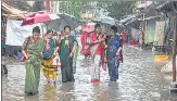  ?? PTI ?? Heavy rain battered Kolkata and its adjoining districts on Monday morning.