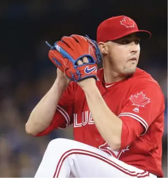  ?? TOM SZCZERBOWS­KI/GETTY IMAGES ?? Aaron Sanchez, who won the ERA title last season, has been battling recurring injuries to his right middle finger.