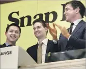  ?? Carolyn Cole Los Angeles Times ?? THE SNAP executives who sold stock Monday got $11.29 to $13.14 a share, down significan­tly from the company’s IPO price. Above, at Snap’s stock debut.