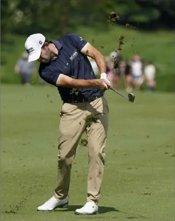  ?? Associated Press ?? Patrick Cantlay hits to the 13th green during the first round of the Memorial golf tournament Friday in Dublin, Ohio.