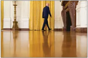  ?? (AP/Andrew Harnik) ?? President Joe Biden leaves a news conference on Russia sanctions Thursday in the East Room of the White House. In expelling 10 diplomats and imposing new sanctions, Biden signaled a harder line against Moscow.