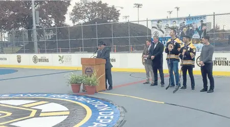  ?? STEVE CONROY/ BOSTON HERALD ?? MOVING MOMENT: Bruins legend Willie O’Ree speaks at the dedication of a street hockey rink named after him on Western Avenue in Allston. In attendance were Bruins president Cam Neely and players Zdeno Chara and Patrice Bergeron.