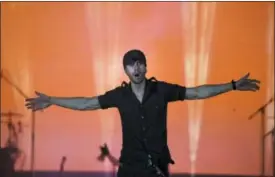  ?? ARIEL SCHALIT — THE ASSOCIATED PRESS ?? Spanish singer Enrique Iglesias performs on stage in Tel Aviv, Israel, Sunday.