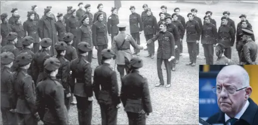  ??  ?? The Black and Tans preparing to leave a barracks Ireland. 1922. Minister for Justice Charlie Flanagan (inset)