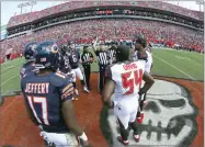  ?? AP PHOTO BY CHRIS O’MEARA ?? In this 2016, file photo, the Chicago Bears and Tampa Bay Buccaneers take part in the coin toss before an NFL football game, in Tampa, Fla.