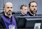  ?? ASSOCIATED PRESS FILE PHOTO ?? Prosecutor Jack Smith, right, and Cezary Michalczuk, left, wait for the start of the trial against Salih Mustafa at the Kosovo Specialist Chambers court in The Hague, Sept. 15, 2021.