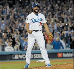  ?? AP PHOTO DAVID J. PHILLIP ?? Los Angeles Dodgers' Kenley Jansen reacts after the final out during the ninth inning of Game 6 of baseball's World Series against the Houston Astros Tuesdayin Los Angeles. The Dodgers won 3-1 to tie the series at 3-3.