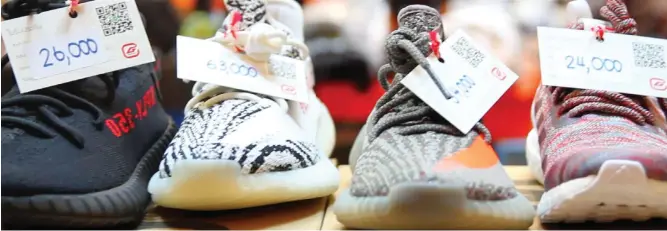  ??  ?? GOTTA CATCH ‘EM ALL: Adidas’ Yeezy lines are known to more than double in retail prices.