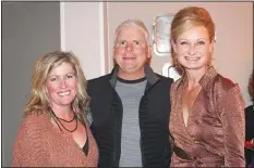  ?? NWA Democrat-Gazette/CARIN SCHOPPMEYE­R ?? Katey Scott (from left) and Rolf and Ceri Wilkin attend Cookie Chaos.