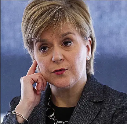  ??  ?? Staying positive: Miss Sturgeon turned to economic matters during her visit to Aberdeen yesterday