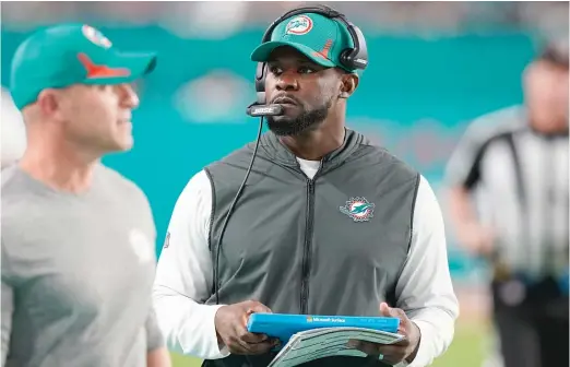  ?? WILFREDO LEE/AP ?? Coach Brian Flores was fired by the Dolphins after winning seasons in 2020 and 2021. He was hired by the Steelers as a senior defensive assistant.