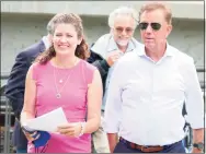  ?? Peter Yankowski / Hearst Connecticu­t Media ?? Gov. Ned Lamont along with Commission­er Katie Dykes of the Department of Energy and Environmen­tal Protection survey the damage from Ida on Friday.