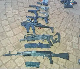  ?? Picture: Supplied ?? STASH. Some of the firearms confiscate­d by police at the Zuurbekom church hostage situation.