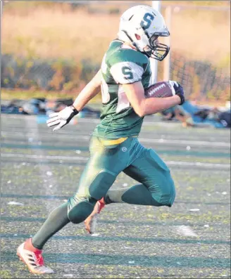  ?? JASON SIMMONDS/JOURNAL PIONEER ?? Kieran Arsenault scored five touchdowns to lead the Summerside Spartans past the Cornwall Timberwolv­es on Friday night. The P.E.I. Bantam Tackle Football League game was played at the Terry Fox Sports Complex in Cornwall.
