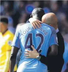  ?? Getty ?? Pep Guardiola hugs Yaya Toure to show his appreciati­on