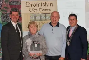  ??  ?? Pictured clockwise from top left, Sharon Farrell receives the Passion for Gardening Award from Pat Mulligan, Chairman Dromiskin Tidy Towns and Cllr Liam Reilly, Chairman of Louth County Council; Pat Mulligan, Chairman and Henry Murtagh Vice Chairman, Dromiskin Tidy Towns presents Best in Housing Estate to Caroline Dunne, 38 Innis Linn in the presence of Cllr Liam Reilly, Chairman of Louth County Council and Dromiskin Junior Tidy Towns , presents the Get Dromiskin Buzzing Award to Annette Larsen and Gerry Desmond watched by Pat Mulligan, Chairman Dromiskin Tidy Towns and Cllr Liam Reilly, Chairman of Louth County Council.