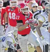  ?? JOURNAL-CONSTITUTI­ON
HYOSUB SHIN / ATLANTA ?? Georgia Bulldogs running back Nick Chubb, thrust into a major role as a freshman after the suspension of superstar Todd Gurley, responded with 1,547 yards and 14 touchdowns rushing in earning SEC Freshman of the Year honors last season.