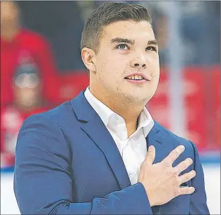  ?? QUEBEC REMPARTS PHOTO/JONATHAN ROY ?? In January, the QMJHL’s Quebec Remparts paid tribute to former team captain Kurt Etchegary. Two months earlier, Etchegary had retired as a player, citing lingering injuries and health issues. However, the 21-year-old from St. John’s says he now feels...