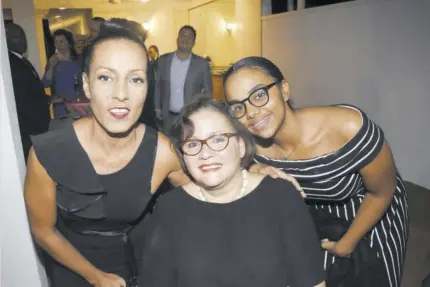  ??  ?? Dr Rosemary Moodie (centre) was pleased to have her niece September Marley (left) and grand-niece Manna Marley in attendance at her celebrator­y reception.