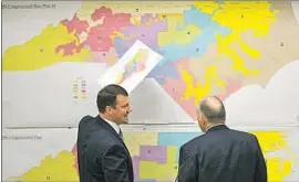  ?? COREY LOWENSTEIN News & Observer ?? THE SUPREME COURT’S rulings Monday will benefit mostly Republican­s. Above, state lawmakers review historical district maps in North Carolina in 2016.
