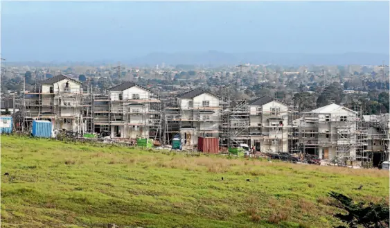  ?? PHOTO: DAVID WHITE/FAIRFAXNZ ?? Economists say housing affordabil­ity is a problem across the nation, and too few are being built.