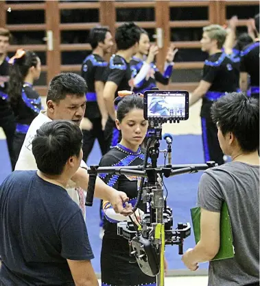  ??  ?? 4 actress Julia Farhana Marin plays the team captain in the video, and she was impressed by the cheerleade­rs’ athleticis­im.