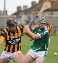  ??  ?? Conor Byrne of Shelmalier­s battling with Páidí Cullen (Cloughbawn).