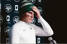  ?? Steven Senne / Associated Press ?? Jets quarterbac­k Zach Wilson talks with reporters following a 10-3 loss to the New England Patriots on Sunday in Foxborough, Mass.