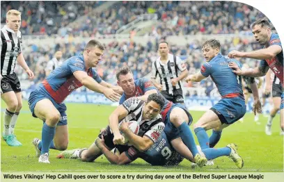  ??  ?? Widnes Vikings’ Hep Cahill goes over to score a try during day one of the Befred Super League Magic