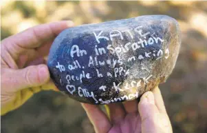  ??  ?? Friends who attended Kate Steinle’s funeral inscribed messages on hundreds of stones, which her parents will make into a rock garden at their Livermore home.