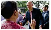  ?? AMANDA VOISARD / AMERICAN-STATESMAN ?? Congressio­nal candidate Chip Roy greets Clydeane “Dede” Altchuler during his rally for Congress on Tuesday at Krause’s Cafe in New Braunfels.