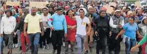  ?? Picture: ZINGISA MVUMVU ?? MEAN MOOD: Disgruntle­d residents of Great Kei marching to the municipal offices, calling for mayor Loyiso Tshetsha’s head and the entire council to step down