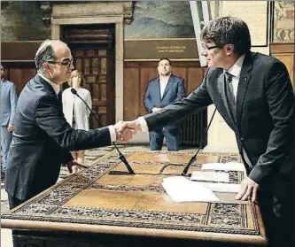  ?? JORDI BEDMAR / GENERALITA­T DE CATALUNYA ?? Turull con Puigdemont, en el acto de toma de posesión como conseller