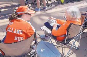  ??  ?? ABOVE: Sunday’s World Cup final between the U.S. and the Netherland­s was a winwin situation for Melline Jullens, left, of Albuquerqu­e, and her mother, Aly Jullens of Baton Rouge, Louisiana. Melline, a dual citizen of the U.S. and Holland, and her mother wore “Hup Holland Hup” shirts to the event at Civic Plaza.