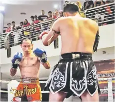  ??  ?? THE MALAYSIAN MACHETE: Trevor (red) in action against Aislay at the Plaza Astana last Sunday.