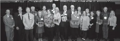  ?? Courtesy photo ?? Representa­tives from the 12 towns in Arkansas that were named a 2017 Volunteer Community of the Year were recognized at the Arkansas Municipal League’s Winter Conference in Fort Smith in January. Siloam Springs was represente­d by Mayor John Mark Turner...