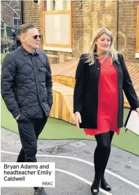  ?? RBKC ?? Bryan Adams and headteache­r Emily Caldwell