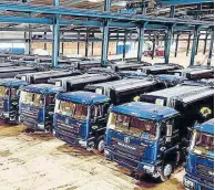  ?? CONTRIBUTE­D ?? Some of the 50 Shacman garbage trucks being prepared at the Tank-Weld dealership for roll-out by the latest, December 1.