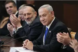  ?? ARIEL SCHALIT — THE ASSOCIATED PRESS FILE ?? Newly sworn-in Israeli Prime Minister Benjamin Netanyahu attends a cabinet meeting in Jerusalem on Dec. 29.