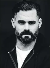  ??  ?? Vancouver artist and designer Jason Dussault once sported a scruffy beard and slicked back hair.