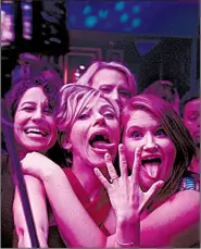  ??  ?? Things go terribly wrong for a group of girlfriend­s — Frankie ( Ilana Glazer), Jess (Scarlett Johansson), Pippa (Kate McKinnon) and Alice (Jillian Bell) — who hire a male stripper for a bacheloret­te party in Miami in Rough Night.