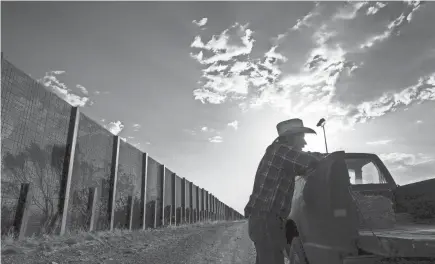  ?? MICHAEL CHOW/USA TODAY NETWORK ?? John Ladd’s ranch in Naco, Ariz., which has been in his family for more than a century, is close to the Mexican border. He’s been frustrated by the undocument­ed immigrants and drug smugglers that cut across his land.