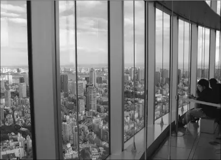  ?? Photos: Larissa Liepens, Postmedia News ?? From the 52nd floor of Tokyo’s Mori Tower, you’ll get a breathtaki­ng, nearly 360-degree view of the city.