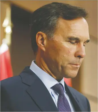  ?? DAVID KaWAI/BLOOMBERG FILES ?? Former finance minister Bill Morneau faces 11 competitor­s for the cushy OECD gig, and 19 public servants are helping him, news that the CBC broke last week, says Diane Francis.