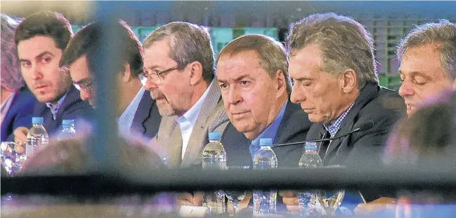  ??  ?? Visibly worn-out President Mauricio Macri made a number of public appearance­s this week including a visit to Córdoba province with Governor Juan Schiaretti.