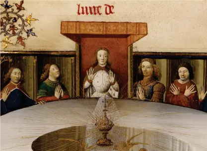  ?? AFP ?? I cavalieri della tavola rotonda. Dettaglio di una miniatura del XIV secolo tratta dalla Storia di Lancillott­o che raffigura l’apparizion­e del Graal davanti ai cavalieri della tavola rotonda