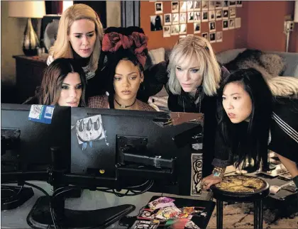  ?? AP PHOTO ?? This image released by Warner Bros. shows, from foreground left, Sandra Bullock Sarah Paulson, Rihanna, Cate Blanchett and Awkwafina in a scene from “Ocean’s 8.”