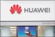  ??  ?? In this file photo, a logo of Huawei is displayed at a shop in Shenzhen,
China’s Guangdong province. Chinese tech giant Huawei has reported a double-digit rise in sales
despite US sanctions that threaten to disrupt its smartphone and network equipment businesses.
(AP)