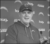 ?? ?? Chargers interim coach Giff Smith talks to the media after practice on Tuesday at the Chargers Hoag Performanc­e Center in Costa Mesa.