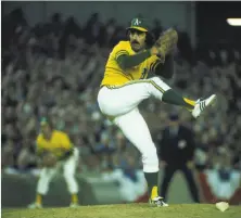  ?? Focus on Sport/Getty Images 1973 ?? Darold Knowles of the A’s pitches against the Mets in the 1973 World Series. He played in all seven games as the A’s won.